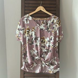 Mauve floral print blouse with knot waist detail. Size medium.
